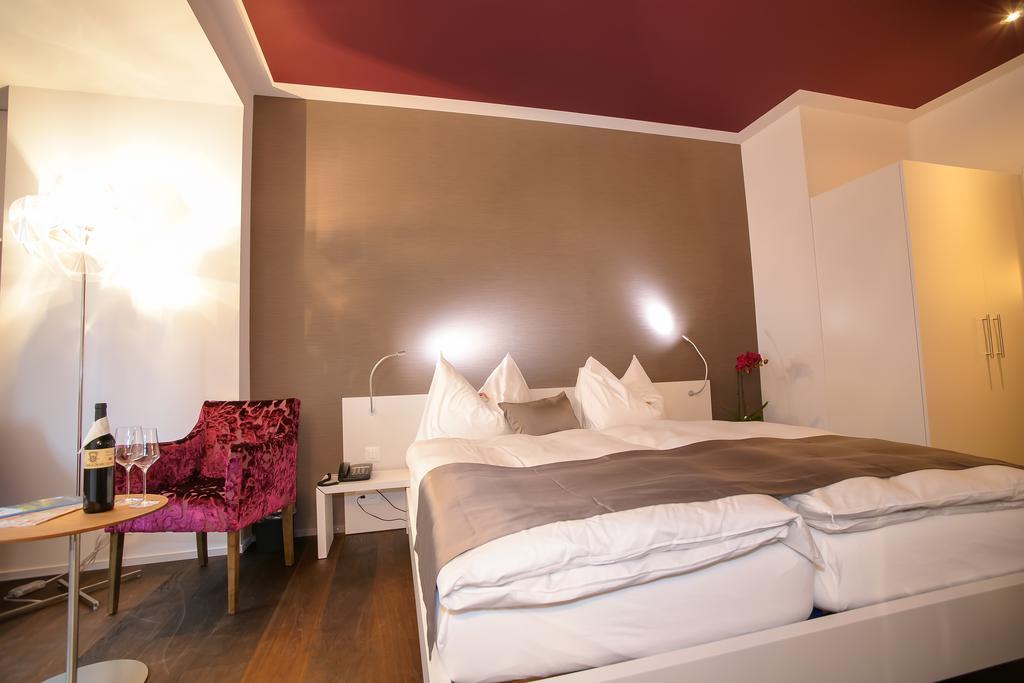 Boutique Hotel - Restaurant Orchidee Burgdorf Quarto foto